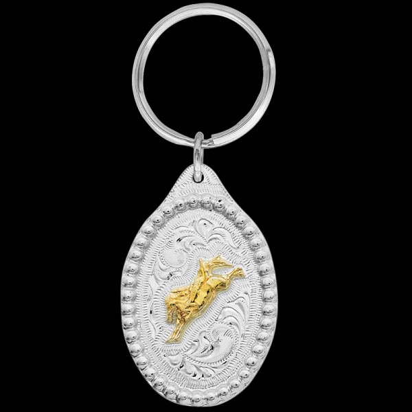 Embrace the spirit of the rodeo with our Gold Bareback Bronc Keychain. Crafted with meticulous attention to detail, this accessory celebrates the adrenaline and skill of bareback bronc riding. 
